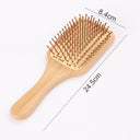 Brosse à cheveux ergonomique 19 cm en bois naturel avec picots arrondis pour un coiffage doux