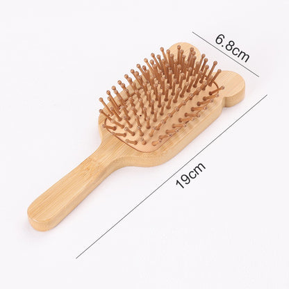 Brosse à cheveux ergonomique 19 cm en bois naturel avec picots arrondis pour un démêlage doux