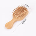 Brosse à cheveux ergonomique 19cm en bois naturel avec picots arrondis pour un coiffage doux