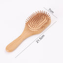 brosse à cheveux ergonomique 19cm en bois naturel avec picots arrondis pour un coiffage doux